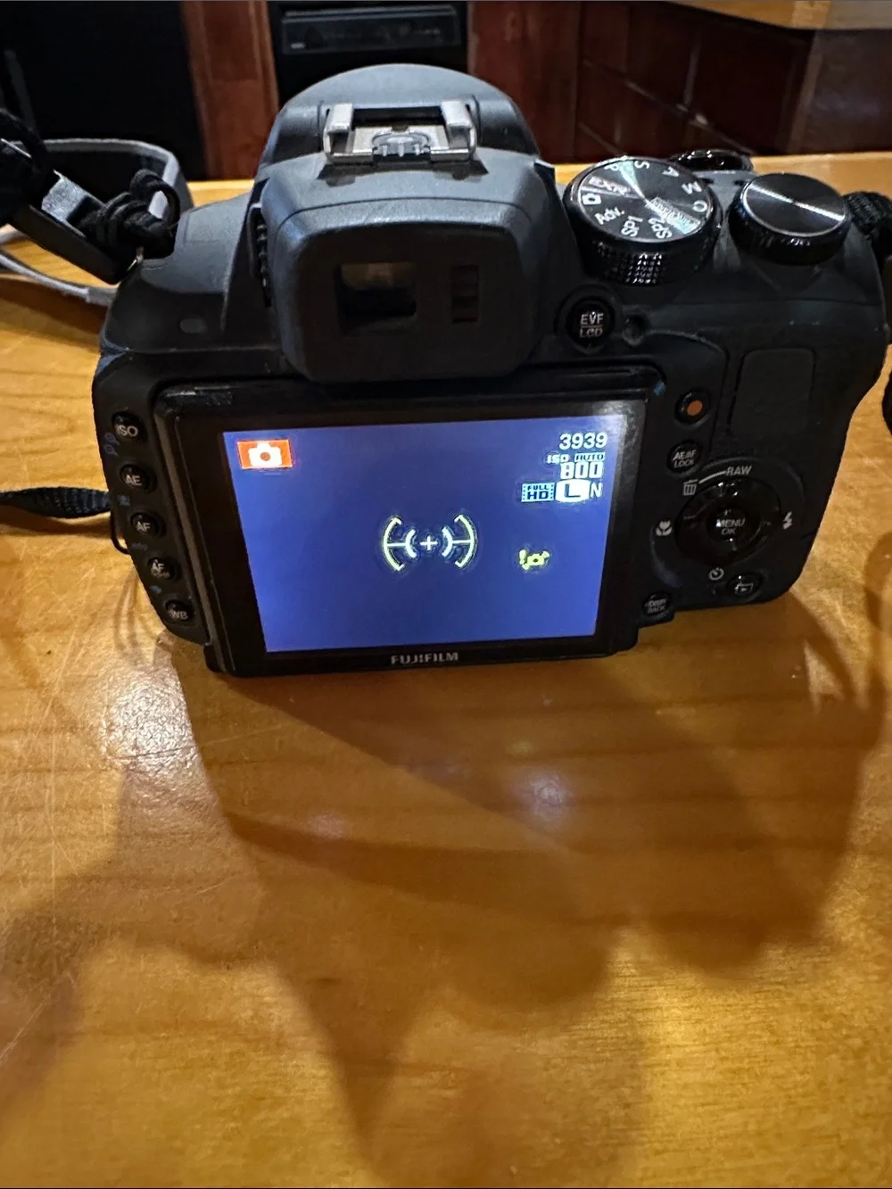 Fujifilm Black Camera Body with Black Lens and Red Trim